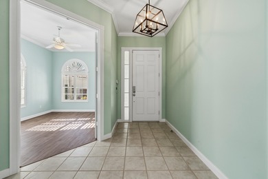 Exceptional 3-bedroom plus office residence located in the gated on Lost Lake Golf Club in Florida - for sale on GolfHomes.com, golf home, golf lot