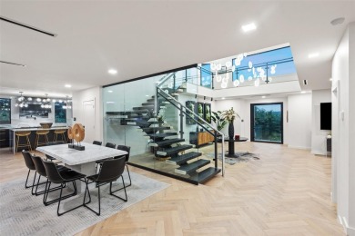 Bold, sophisticated, and move-in ready -- this natural modern on Austin Country Club in Texas - for sale on GolfHomes.com, golf home, golf lot
