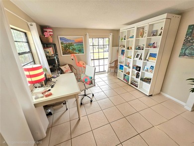 WATERFRONT, saltwater POOL home with no flood insurance needed! on Palm Harbor Golf Club in Florida - for sale on GolfHomes.com, golf home, golf lot