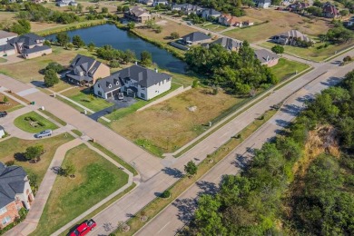 5-acre corner lot with a picturesque view in the scenic Lake on Tangle Ridge Golf Club in Texas - for sale on GolfHomes.com, golf home, golf lot