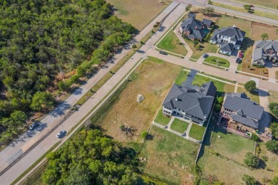 5-acre corner lot with a picturesque view in the scenic Lake on Tangle Ridge Golf Club in Texas - for sale on GolfHomes.com, golf home, golf lot