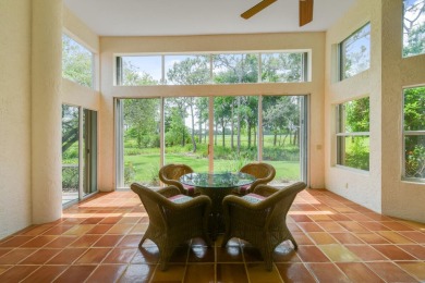Nestled within the serene and exclusive Harbour Ridge Yacht & on Harbour Ridge Yacht and Country Club in Florida - for sale on GolfHomes.com, golf home, golf lot