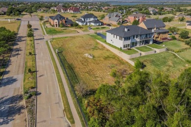 5-acre corner lot with a picturesque view in the scenic Lake on Tangle Ridge Golf Club in Texas - for sale on GolfHomes.com, golf home, golf lot