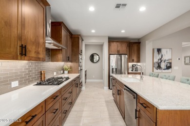 This beautiful Tesoro model is nearly new and is situated on a on Tuscany Falls At Pebble Creek in Arizona - for sale on GolfHomes.com, golf home, golf lot