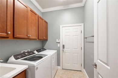 Experience Florida living at its finest in this beautifully on The Plantation Golf and Country Club in Florida - for sale on GolfHomes.com, golf home, golf lot