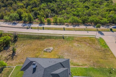 5-acre corner lot with a picturesque view in the scenic Lake on Tangle Ridge Golf Club in Texas - for sale on GolfHomes.com, golf home, golf lot