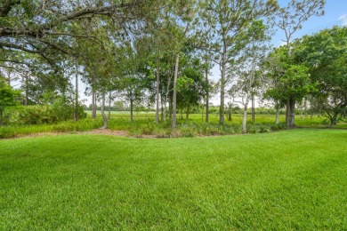 Nestled within the serene and exclusive Harbour Ridge Yacht & on Harbour Ridge Yacht and Country Club in Florida - for sale on GolfHomes.com, golf home, golf lot