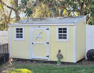 WATERFRONT, saltwater POOL home with no flood insurance needed! on Palm Harbor Golf Club in Florida - for sale on GolfHomes.com, golf home, golf lot