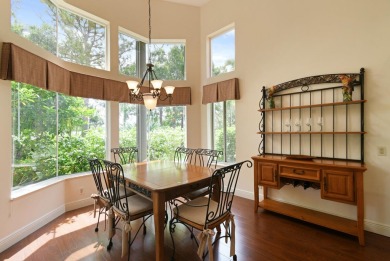 Nestled within the serene and exclusive Harbour Ridge Yacht & on Harbour Ridge Yacht and Country Club in Florida - for sale on GolfHomes.com, golf home, golf lot