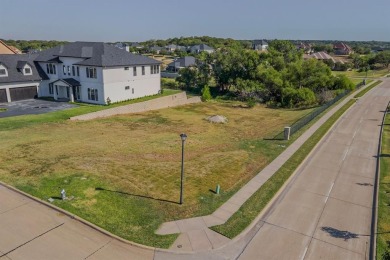 5-acre corner lot with a picturesque view in the scenic Lake on Tangle Ridge Golf Club in Texas - for sale on GolfHomes.com, golf home, golf lot