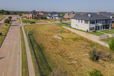 5-acre corner lot with a picturesque view in the scenic Lake on Tangle Ridge Golf Club in Texas - for sale on GolfHomes.com, golf home, golf lot