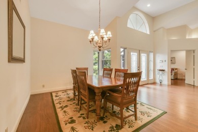 Nestled within the serene and exclusive Harbour Ridge Yacht & on Harbour Ridge Yacht and Country Club in Florida - for sale on GolfHomes.com, golf home, golf lot