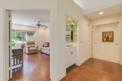 Nestled within the serene and exclusive Harbour Ridge Yacht & on Harbour Ridge Yacht and Country Club in Florida - for sale on GolfHomes.com, golf home, golf lot