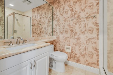 Nestled within the serene and exclusive Harbour Ridge Yacht & on Harbour Ridge Yacht and Country Club in Florida - for sale on GolfHomes.com, golf home, golf lot
