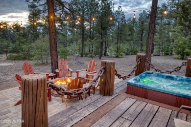 MAGNIFICENT, TURN-KEY FURNISHED FULL LOG CABIN, BACKING NATIONAL on Torreon Golf Club in Arizona - for sale on GolfHomes.com, golf home, golf lot