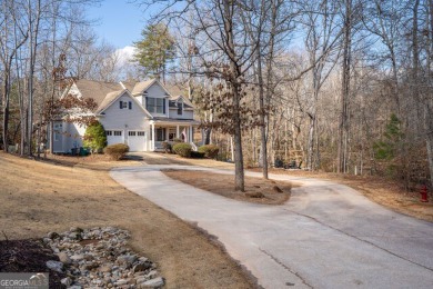 Welcome to a world of elegance and comfort, perfectly nestled in on Currahee Golf Club in Georgia - for sale on GolfHomes.com, golf home, golf lot