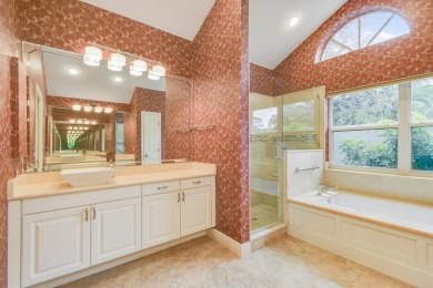 Nestled within the serene and exclusive Harbour Ridge Yacht & on Harbour Ridge Yacht and Country Club in Florida - for sale on GolfHomes.com, golf home, golf lot