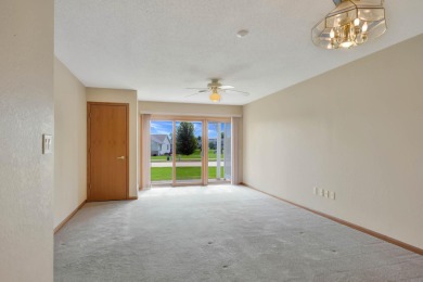 Welcome to this fantastic two-bedroom, one-bathroom condo on Centennial Oaks Golf Club in Iowa - for sale on GolfHomes.com, golf home, golf lot