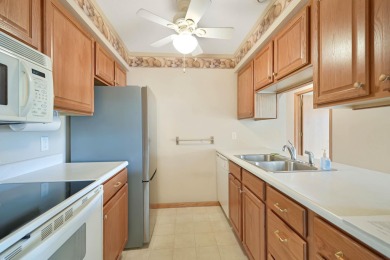 Welcome to this fantastic two-bedroom, one-bathroom condo on Centennial Oaks Golf Club in Iowa - for sale on GolfHomes.com, golf home, golf lot