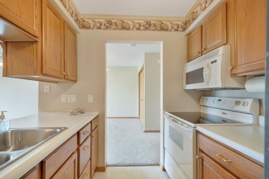 Welcome to this fantastic two-bedroom, one-bathroom condo on Centennial Oaks Golf Club in Iowa - for sale on GolfHomes.com, golf home, golf lot