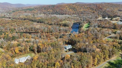 Discover the epitome of tranquility and seclusion with this on The Club at River Oaks in Connecticut - for sale on GolfHomes.com, golf home, golf lot