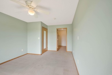 Welcome to this fantastic two-bedroom, one-bathroom condo on Centennial Oaks Golf Club in Iowa - for sale on GolfHomes.com, golf home, golf lot
