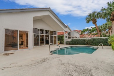 This home features relaxing water and golf views! It offers 3 on Frenchmans Creek Country Club in Florida - for sale on GolfHomes.com, golf home, golf lot