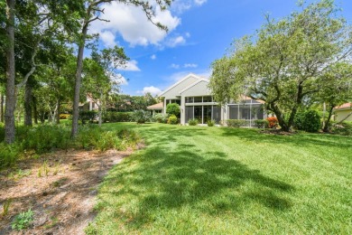 Nestled within the serene and exclusive Harbour Ridge Yacht & on Harbour Ridge Yacht and Country Club in Florida - for sale on GolfHomes.com, golf home, golf lot