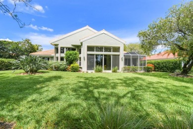 Nestled within the serene and exclusive Harbour Ridge Yacht & on Harbour Ridge Yacht and Country Club in Florida - for sale on GolfHomes.com, golf home, golf lot