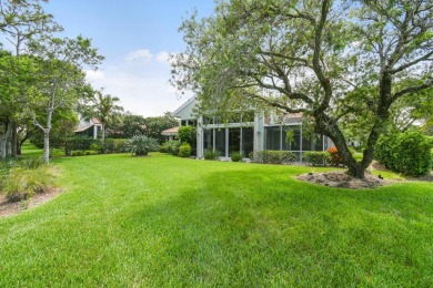 Nestled within the serene and exclusive Harbour Ridge Yacht & on Harbour Ridge Yacht and Country Club in Florida - for sale on GolfHomes.com, golf home, golf lot
