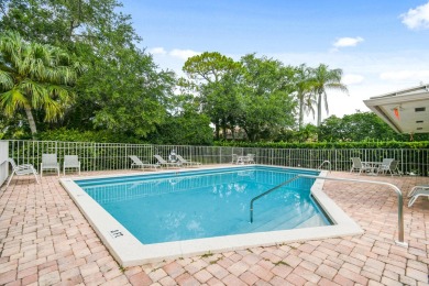 Nestled within the serene and exclusive Harbour Ridge Yacht & on Harbour Ridge Yacht and Country Club in Florida - for sale on GolfHomes.com, golf home, golf lot