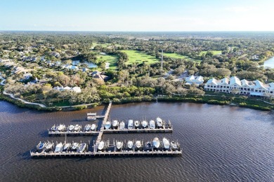 Nestled within the serene and exclusive Harbour Ridge Yacht & on Harbour Ridge Yacht and Country Club in Florida - for sale on GolfHomes.com, golf home, golf lot