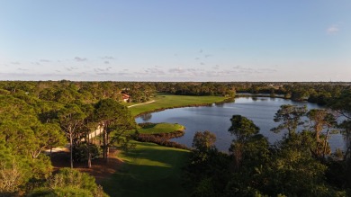 Nestled within the serene and exclusive Harbour Ridge Yacht & on Harbour Ridge Yacht and Country Club in Florida - for sale on GolfHomes.com, golf home, golf lot