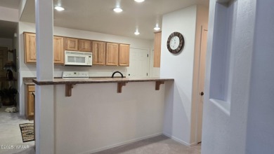 ENJOY THIS GATED COMMUNITY, Detached home 2-story with 1 guest & on Pinetop Lakes Golf and Country Club in Arizona - for sale on GolfHomes.com, golf home, golf lot