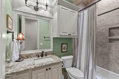 Beautiful waterfront home in the gated community of the Shores on Lake Caroline Golf Club in Mississippi - for sale on GolfHomes.com, golf home, golf lot