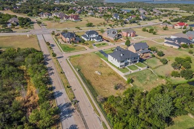 5-acre corner lot with a picturesque view in the scenic Lake on Tangle Ridge Golf Club in Texas - for sale on GolfHomes.com, golf home, golf lot