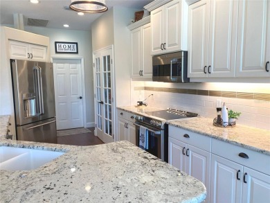 Updated Spotless Home with Stunning Golf Course Views in Calusa on Calusa Lakes Golf Club in Florida - for sale on GolfHomes.com, golf home, golf lot