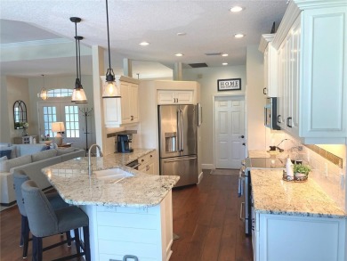 Updated Spotless Home with Stunning Golf Course Views in Calusa on Calusa Lakes Golf Club in Florida - for sale on GolfHomes.com, golf home, golf lot