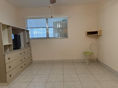 Ground floor 2 bedroom, 2 bath true corner unit with canal view on Addison Reserve in Florida - for sale on GolfHomes.com, golf home, golf lot