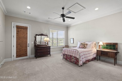Beautiful waterfront home in the gated community of the Shores on Lake Caroline Golf Club in Mississippi - for sale on GolfHomes.com, golf home, golf lot
