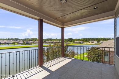 Beautiful waterfront home in the gated community of the Shores on Lake Caroline Golf Club in Mississippi - for sale on GolfHomes.com, golf home, golf lot