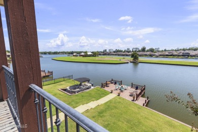 Beautiful waterfront home in the gated community of the Shores on Lake Caroline Golf Club in Mississippi - for sale on GolfHomes.com, golf home, golf lot