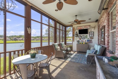 Beautiful waterfront home in the gated community of the Shores on Lake Caroline Golf Club in Mississippi - for sale on GolfHomes.com, golf home, golf lot