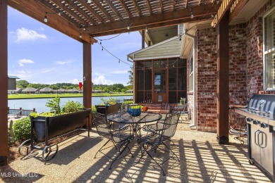 Beautiful waterfront home in the gated community of the Shores on Lake Caroline Golf Club in Mississippi - for sale on GolfHomes.com, golf home, golf lot