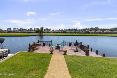 Beautiful waterfront home in the gated community of the Shores on Lake Caroline Golf Club in Mississippi - for sale on GolfHomes.com, golf home, golf lot