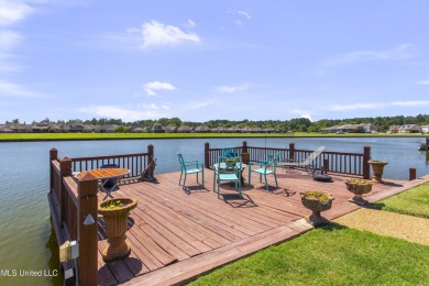 Beautiful waterfront home in the gated community of the Shores on Lake Caroline Golf Club in Mississippi - for sale on GolfHomes.com, golf home, golf lot