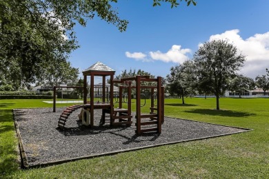 Concrete Block Home On Spacious Corner Lot Close To The Beach on Marsh Creek Country Club in Florida - for sale on GolfHomes.com, golf home, golf lot