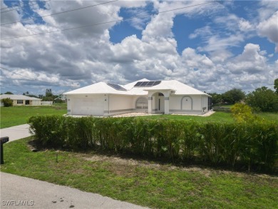 Waterfront Pool Home with Solar in exclusive Cape Coral! Welcome on El Rio Golf Course and Club in Florida - for sale on GolfHomes.com, golf home, golf lot