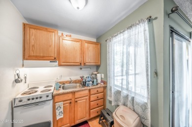 Private, airy studio in Salem Plaza. Enjoy your coffee on the on Washoe County Golf Club in Nevada - for sale on GolfHomes.com, golf home, golf lot