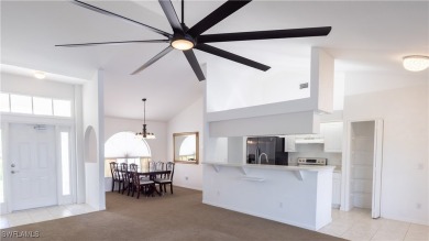 Waterfront Pool Home with Solar in exclusive Cape Coral! Welcome on El Rio Golf Course and Club in Florida - for sale on GolfHomes.com, golf home, golf lot